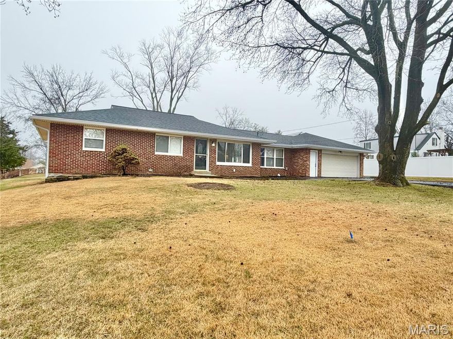 Fully updated and move-in ready, this stunning all-brick ranch offers over 3,000 sq ft of living space on more than ½ acre! Featuring 3 bedrooms and 3 full baths, this home combines timeless charm with modern updates and an open, functional layout. Enjoy a spacious living and dining room that flows seamlessly into the heart of the home — a chef’s dream kitchen complete with a large center island, granite countertops, white 42” cabinetry, pantry, and an abundance of cabinet and counter space. The open floor plan makes entertaining effortless, while the expansive sun porch provides the perfect space to relax year-round. The main level includes three generously sized bedrooms, including a primary suite with a private full bath, plus a beautifully updated hall bath. The fully finished walk-out lower level offers incredible additional living space with a third full bath and endless possibilities — design a family room, recreation area, home office, gym, or guest suite to fit your lifestyle. Additional highlights include an oversized 2-car garage, large patio for outdoor gatherings, and a prime location within walking distance to the school. With space, style, flexibility, and the abundance amount of updates; this home truly perfectll!