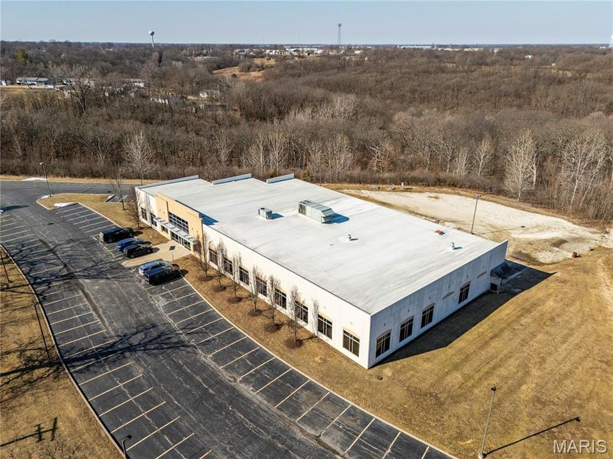 Commercial Opportunity with Infrastructure for Growth
This expansive commercial property offers over 18,000 square feet of versatile office and operational space, designed to support a wide range of professional, institutional, and industrial uses. The building features a convenient loading dock, making deliveries and logistics seamless for warehouse or distribution needs.
Inside, a dedicated data storage center with enhanced fire-proofing has been built to meet strict audit and compliance standards, providing peace of mind for medical, government, or technology users. A powerful Caterpillar generator capable of supporting three buildings ensures reliable backup power, while redundant internet connectivity adds an additional layer of operational security.
The flexible layout allows for multiple office configurations or tenant divisions, making the property ideal for medical offices, a college satellite campus, municipal or administrative offices, warehouse operations, or multi-tenant office space. With ample surrounding land available for future development, this property offers both immediate functionality and long-term expansion potential