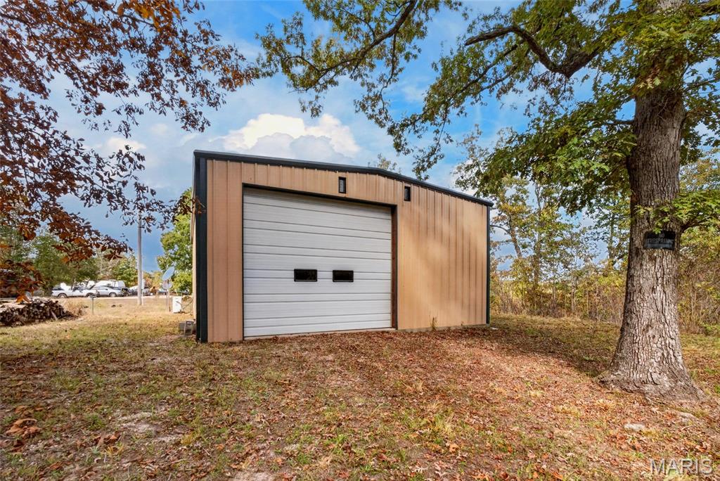 Photo of 9 Verbena Trail, Tunas, MO 65764 (MLS # 26067695)