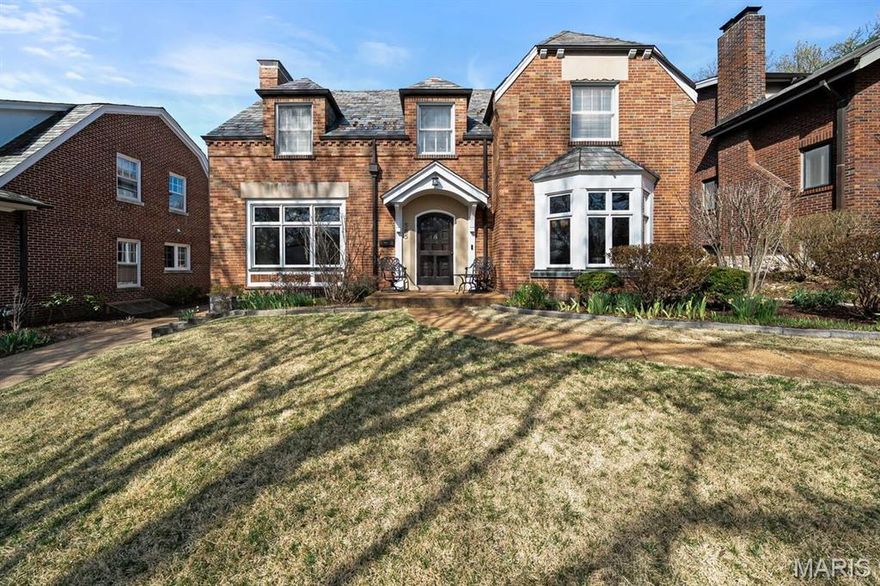 Set on a charming tree-lined street, this home offers the ideal blend of neighborhood feel and city convenience. Enjoy walkable access to parks, shops, and local favorites while still having a quiet place to unwind at the end of the day.

The main floor unfolds with an effortless, highly functional layout designed for modern living. Expansive living and dining spaces flow seamlessly, anchored by rich hardwood flooring and classic architectural details. A versatile den offers the perfect setting for a cozy lounge or library, while a dedicated office provides a quiet, tucked-away work-from-home retreat. The mudroom adds everyday ease with stylish functionality, and a well-placed powder room completes the main level.

Upstairs, the oversized primary suite is a true retreat—generous in scale and elevated in feel. In addition to the spacious sleeping quarters, a separate adjoining office or sitting room creates a private, flexible extension of the suite. Two additional bedrooms share a beautifully appointed Jack-and-Jill bathroom, offering both comfort and convenience.
The partially finished lower level provides additional living area and a ratskeller-style space—ideal for entertaining, game nights, or casual lounging—along with an additional half bath. Unfinished areas provide ample storage and a dedicated laundry space.

Step outside to discover beautifully curated gardens that transform the backyard into a private oasis. Lush plantings and layered greenery create a serene, storybook setting—perfect for morning coffee, evening gatherings, or quiet moments outdoors.

Perfectly positioned in the heart of University City, 585 Stratford Ave delivers the lifestyle buyers are chasing, just minutes from Clayton’s vibrant dining and business district and a quick hop to Washington University. Whether you’re commuting, catching a game, or grabbing a bite at Taco Buddha, the location simply doesn’t get better.