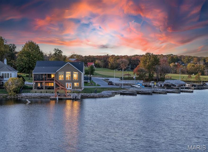 Property Viewings Begin at the Open House11/09!  Waterfront Living at its Finest! Can you imaging a Peninsula site with three sides of panoramic water views?  Enjoy lake life in this New England Style home with 3 spacious Bedrooms and 3 Full Baths.  Located in the highly desirable community, Incline Village, in convenient Foristell, Missouri.  This is a rare opportunity to secure a custom built home that is just 8 years new.  It combines the modern features and finishes in a setting that captures the endless Panoramic Lake Views. 

The inviting concept features: granite counters, tinted windows for controlled natural light that illuminates the interior.
A Grand Primary Suite offers a private retreat with an indulgent Bath and private access to your private deck.  What a way to greet every morning with a smile.

The finished Terrace Level includes a walk-out to a level lawn and fenced rear yard.  Such a rare find to secure an easy approach to all of your water activities. You are just steps away from dipping your toes in the water.  . Relax on the deck with a summit view or have your beverage from your private boat dock, perfect for fishing, boating or simply soaking in the serenity of lakeside living. 

Whether you're entertaining guests or enjoying quiet evenings by the lake, this home offers the ideal waterfront lifestyle. Don't miss your chance to own a newer  move-in ready retreat in a community known for recreation, natural beauty, relaxation.  Enjoy!