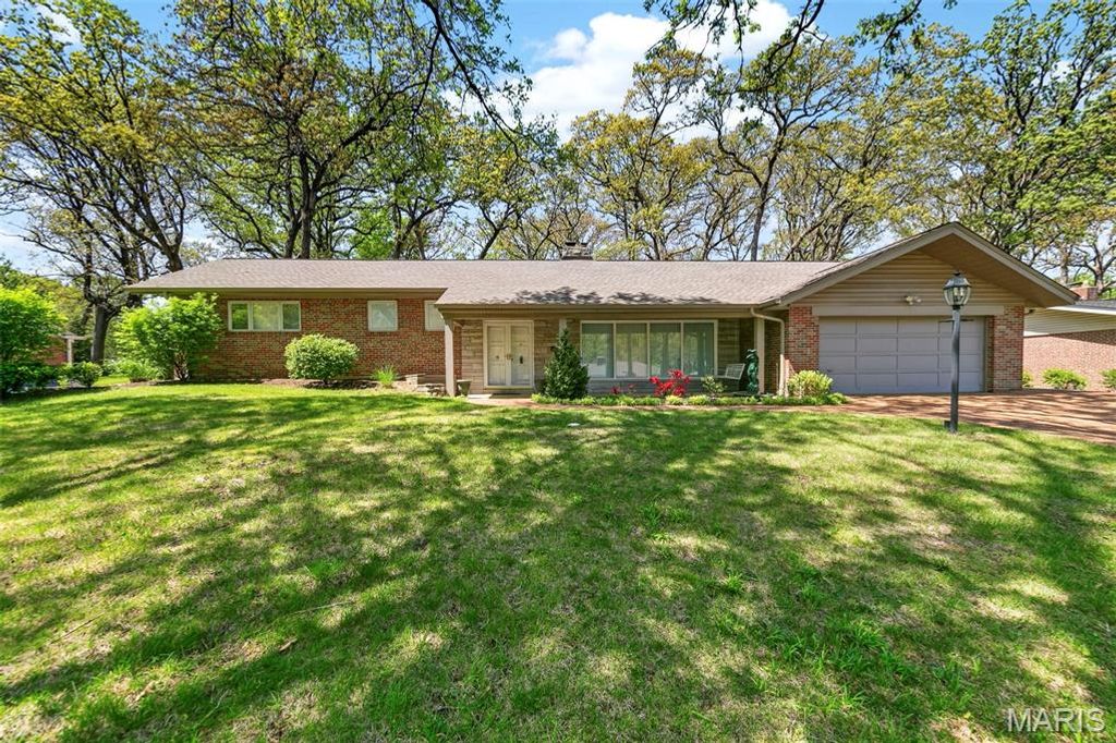 Photo of 8827 Rock Forest Drive, Grantwood Village, MO 63123 (MLS # 26024221)