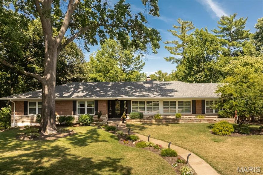 This stunning all-brick and stone ranch rests on a picturesque .66-acre lot with a sparkling 20x40 upgraded saltwater pool—the perfect retreat for relaxation and entertaining! Inside, the inviting entry opens to the formal dining and living rooms, showcasing wood floors, custom millwork, and plantation shutters. The updated kitchen is a showstopper with newer stainless steel appliances, abundant white cabinetry, and granite countertops with two seating areas. Multiple gathering spaces include a sunlit family room with a fireplace and tree-lined views, a cozy breakfast area with beverage bar, and an impressive three-season room with its own fireplace. A main floor laundry and half bath add convenience. The private primary suite features double closets and a beautifully updated bath, while two additional bedrooms share a spacious full bath with double sinks. The finished walkout lower level expands your living space with a family room and fireplace, a 4th bedroom, full bath, large guest space, home gym, cedar walk-in closet, and even another half bath, along with generous storage and recreation areas. Outdoors, enjoy the large patio, niches and expanded cool deck surrounding pool and professional landscaping. Evening ambiance shines with exterior and LED pool lighting and the yard stays lush with the inground sprinkler system. Additional highlights include a side-entry two-car garage, oversized driveway, and new roof. This exceptional home blends comfort, style, and amenities.