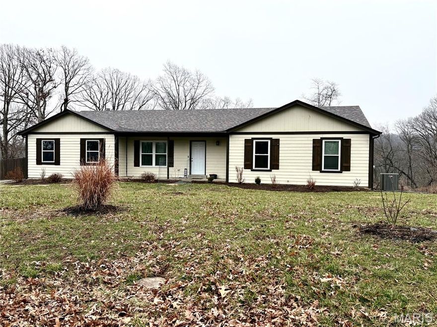 This beautiful 3-bedroom, 2-bath home with vaulted ceilings, beautiful views, and a feeling of being secluded in High Ridge is ready for a new owner. Home is updated with wood flooring, updated baths, new doors throughout, and new and modern lighting.   The new and huge deck has steps to the yard and above-ground pool with a view of the hills of High Ridge that is unmatched.  The kitchen has stainless steel appliances, lots of cabinets, a pantry, and new lighting.  The dining area has new lighting, spacious and open, with a huge arched picture window. The family room has a wood-burning fireplace and is floor-to-ceiling with new windows. The main floor laundry is an added bonus.  The primary bedroom is also vaulted with a ceiling fan, a walk-in 9’ closet, wood flooring, and access to the oversized deck for that morning cup of coffee while listening to the sounds of the valley. The beautiful primary bathroom has a large spa tub, walk-in shower, and new double-sink vanity and fixtures. There is room in the walk-out lower level for another bedroom.  The lower level also has a steam room roughed in and a full bath rough-in.  This is NOT the home to miss.