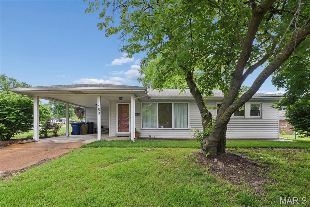 Photo of 1150 Charbonnier Road, Florissant, MO 63031 (MLS # 26026544)
