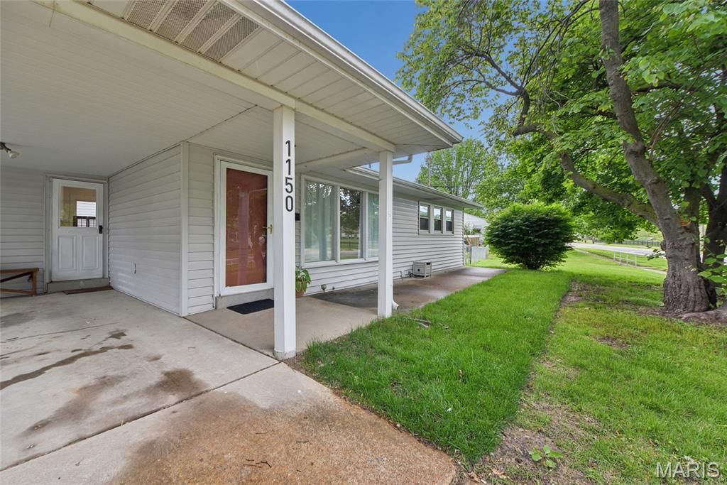 Photo of 1150 Charbonnier Road, Florissant, MO 63031 (MLS # 26026544)
