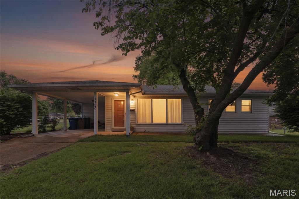 Photo of 1150 Charbonnier Road, Florissant, MO 63031 (MLS # 26026544)