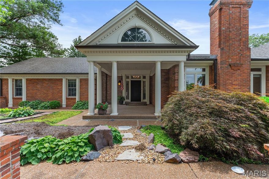 Beautifully updated villa in the gated community of Woodbridge Manor. This end-unit home offers over 5,000 square feet of living space, including the finished lower level. You're welcomed by a dramatic two-story foyer that sets the tone for the light-filled interiors. The living room is bright and inviting, with a fireplace, hardwood floors, and sliding doors that open to a large brick courtyard. The spacious dining room also features patio access, perfect for indoor-outdoor entertaining. The updated kitchen includes custom cabinetry, quartz counters, and a breakfast room that overlooks the courtyard. The main-level primary suite is a true retreat, featuring a fireplace, an oversized walk-in closet with wood floors, and a newly renovated bath that includes a soaking tub, an oversized shower, a double vanity, and ample storage. A den with a wet bar, wine storage, and fireplace, as well as a laundry room and powder room, complete the main level. Upstairs, you'll find two private bedroom suites with newly updated bathrooms. The finished lower level features a large recreation room with a fireplace, built-in storage, and ample space. A 2-car garage completes this rare offering in one of Creve Coeur's most sought-after neighborhoods. Private community pool.