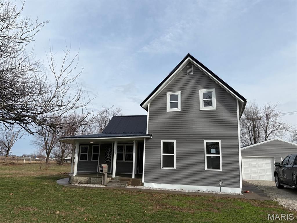 Photo of 312 E Beech Street, Shelbina, MO 63468 (MLS # 26013625)