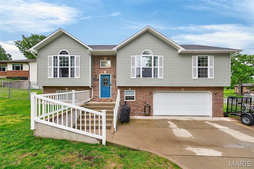 Welcome to 21470 Sail Rd! This well-appointed home offers generous living space and standout features throughout. The kitchen is designed to impress with granite countertops, tile backsplash, wood flooring, range top, and double wall ovens. Arched doorways and updated lighting, paired with updating flooring highlight how this home is dressed to impress! Retreat to the oversized primary suite complete with separate his and hers closets, vaulted ceiling, plant shelf and palladian window. The lower-level family room creates the perfect space for relaxing or entertaining, while the dedicated laundry room keeps daily living organized. Enjoy the benefits of a large garage, additional parking to the side of the driveway, and a fenced corner lot offering both space and privacy. Conveniently located in off the beaten path in the Forest Hills subdivision in Waynesville, minutes from downtown, I-44 and the Fort, without sacrificing privacy.