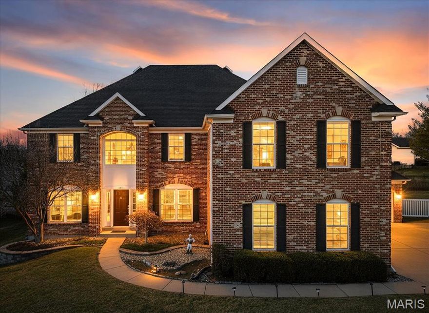 "Got me dreaming bout a driveway with a basketball hoop!"  This is what it feels like to get everything on your wish list!   Sitting pretty at the end of the cul-de-sac with a large lot and 3 car garage this one has space for everyone! As you enter the grand foyer with juliet balcony and soaring ceilings makes the best first impression.  The gleaming hardwood floors, 9-foot ceilings, crown molding, and recessed lighting create a bright and refined atmosphere throughout.
The custom kitchen is designed for both function and style, featuring 42" maple cabinetry, granite countertops, stainless steel appliances, a built-in double oven, center island, planning desk, and a spacious walk-in pantry. A bay window in the breakfast room opens to a newly built low maintenance composite deck spills over to the large, level yard for your years of memories to be made.   
The main floor includes a flex room the seller's used as a bedroom.  Upstairs, a grand loft sitting area leads to the primary suite of your dreams showcasing crown molding, recessed lighting, built-in bookcases, a private sitting area, dual walk-in closets with custom shelving, and a luxurious primary bath. You will also find two large bedrooms serviced by a jack and jill bathroom, and another full bedroom suite!  
The finished lower level is an entertainer’s dream, offering a rec room, game room, built-in wet bar, bonus sitting area, and a fourth full bath. Additional updates include new flooring in the laundry room and first floor bedroom/office, freshly painted walls, banisters, and cabinetry in the main bathroom. Other highlights include a newer roof, zoned HVAC, inground irrigation system, and ample storage throughout.
This home offers exceptional space, thoughtful updates, and outstanding indoor and outdoor living—perfect for everyday comfort and memorable gatherings.