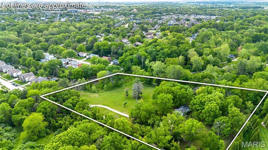 Set within one of Town and Country’s most coveted locations, this extraordinary 5.85-acre estate parcel offers a rare blend of privacy, natural beauty, and unmatched convenience. Enveloped by mature woods and gently rolling terrain, the property presents a serene, park-like setting with picturesque views and direct adjacency to Queeny Park, allowing seamless access without the need to cross any major roads. Equestrian-friendly and exceptionally private, the land invites a vision of refined country living just minutes from modern amenities. Easy access to highways, leading hospitals, upscale shopping, dining destinations, and top-rated Parkway schools are all within effortless reach, striking a perfect balance between seclusion and accessibility. Whether envisioned as a legacy residence, a custom build, or a thoughtfully designed development opportunity, this offering represents a truly rare chance to create something exceptional in a close-in location where land of this caliber is seldom available.