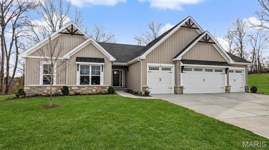 The Hudson Ranch home has a 2 car side entry garage & a 2 car front entry garage w/ plenty of storage. Features Include a Double Front Door, Laminate Floors throughout much of the main floor, upgrade white, staggered, soft close cabinets w/ dove tailed drawers, Stainless Appliances, a wood hood, a huge island, Cambria countertops, tiled backsplash, can lighting, Microwave drawer & walk in pantry.  The breakfast room has a 9' wide slider that goes out to a composite deck.   The Primary bath has an upg. shower, double bowl, adult hght. vanities, Granite Elite counters & Moen matte black faucets.  Other features include iron spindles, 4' wide stairs to lower level, 8' tall doors, 5 1/4" base, 3 1/4" door casing, 8' tall carriage style, insulated garage doors, exterior soffit lighting & a fully sodded & landscaped yard.