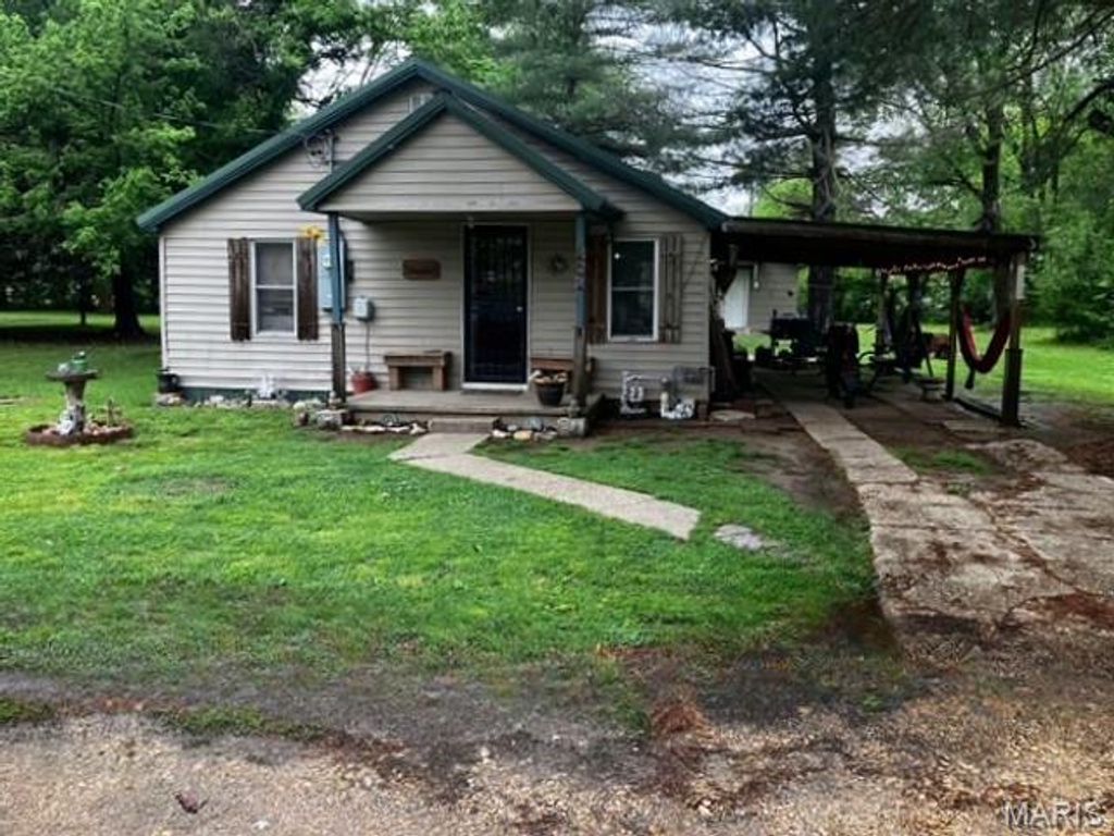 Photo of 203 N Nelson Avenue, Dexter, MO 63841 (MLS # 26027267)