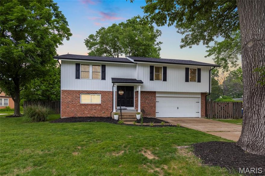 Welcome home to this beautifully renovated 3-bedroom, 3-bath gem featuring stylish updates and exceptional living space throughout. The heart of the home is the stunning custom chef’s kitchen, complete with white shaker cabinetry, quartz countertops, a large center island, brand-new stainless appliances, and designer finishes that make it perfect for both everyday living and entertaining.

New engineered hardwood flooring flows throughout the main level, which includes three spacious bedrooms, including a private primary suite with an updated en suite bath and gorgeous custom tilework. Every bathroom in the home has been thoughtfully renovated with modern finishes and attention to detail.

The fully finished lower level offers expansive additional living space ideal for movie nights, game days, or hosting family and friends, along with a convenient half bath and oversized laundry room.

Step outside to enjoy the new covered deck overlooking the flat backyard, complete with a firepit area and patio/court space — ready for relaxing evenings and entertaining all season long.