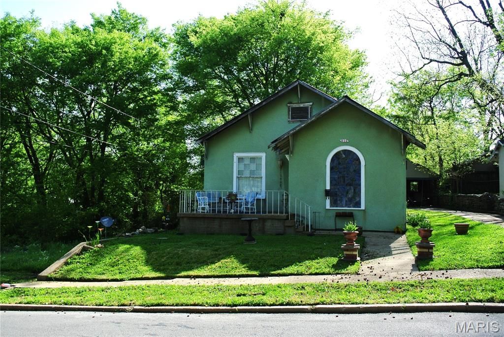 Photo of 812 Benton Street, Poplar Bluff, MO 63901 (MLS # 26025421)