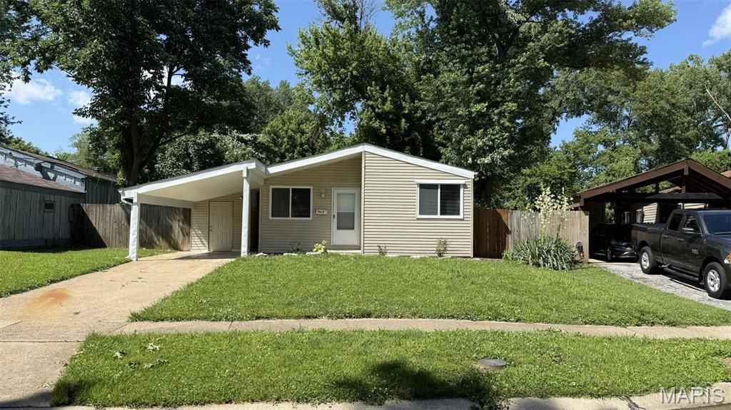 Photo of 1332 Langholm Drive, Florissant, MO 63031 (MLS # 26019489)