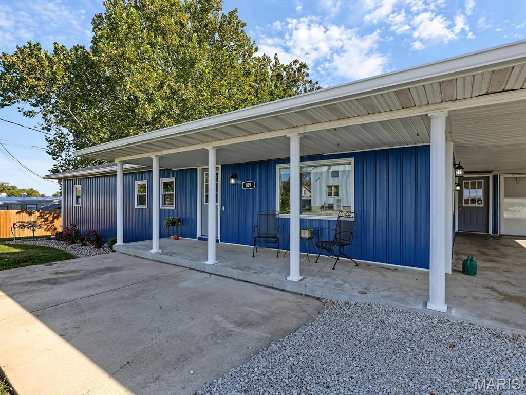 Photo of 819 W Ross Street, Palmyra, MO 63461 (MLS # 26068092)