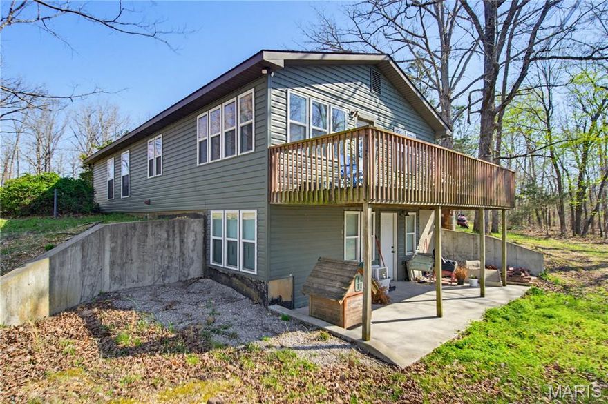 Welcome to peaceful country living just minutes from Poplar Bluff! This super cute 3-bedroom, 3-bathroom home sits on 3 beautiful acres along a paved county road, offering the perfect mix of convenience and privacy. The property features its own private pond, creating a serene setting right in your backyard. Enjoy your morning coffee or relax in the evenings on the deck overlooking the water while taking in the peaceful surroundings and scenic views. Inside, the home offers comfortable living spaces with a functional layout and a basement that provides additional space and flexibility. With open acreage, a private pond, and quick access to town, this charming property offers the best of both worlds — quiet country living with everyday conveniences just a short drive away. Don’t miss your chance to own this beautiful property!