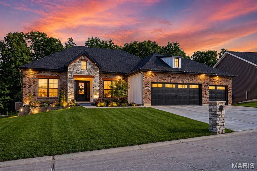 Tucked against a peaceful tree-lined backdrop, this stunning 4 bed, 3.5 bath home with a 3-car garage delivers the space, style, and privacy today’s buyers are searching for. From the moment you walk in, you’ll notice the abundance of natural light pouring through oversized windows creating a bright, welcoming feel throughout the open floor plan.
The heart of the home is the quartz island kitchen, designed to impress with modern finishes, ample prep space, and seamless flow into the main living area - perfect for entertaining or everyday living. A dedicated home office/study offers the ideal setup for remote work or a quiet retreat.
The primary suite is a true showstopper and features a spa-like bath with a frameless glass walk-in shower, soaking tub, and elevated finishes that make it feel like your own private getaway.
With generously sized bedrooms, 3.5 baths, and a backyard that backs to trees for added privacy and peaceful views, this home checks every box.  The fenced backyard, large patio and firepit add to the outdoor living space, along with the open deck.

Schedule your showing today and see why buyers are making the move to modern, low-maintenance living.  This home is in an ideal location in Washington, Missouri and is close to shopping, parks and walking trails.