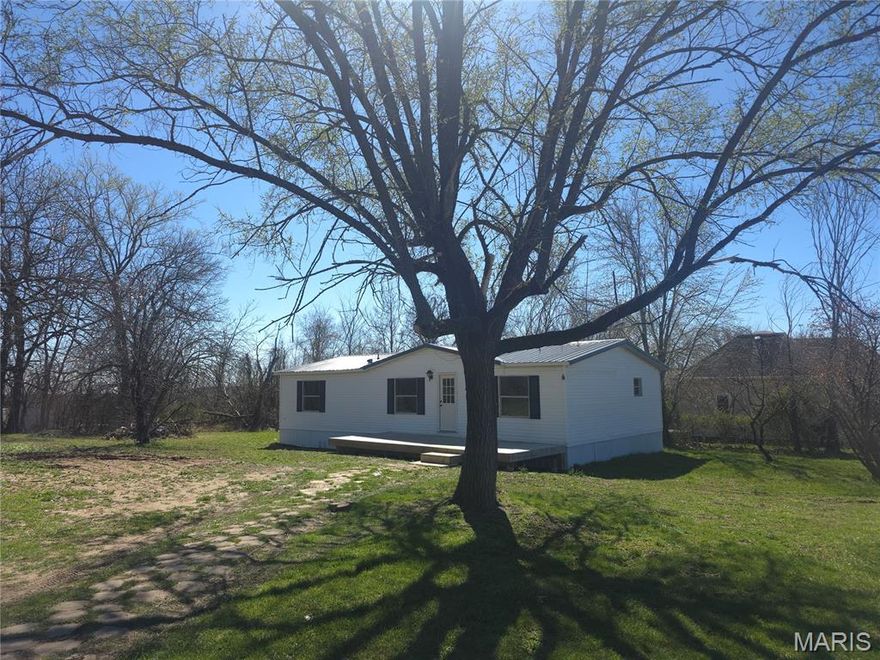 Welcome to this beautifully updated 3-bedroom, 2-bathroom mobile home that blends modern comfort with everyday convenience. Step inside to an open, inviting layout featuring durable vinyl plank flooring throughout the main living areas and plush carpeting in all bedrooms for added warmth and comfort.

The kitchen shines with brand-new stainless steel appliances, cabinets and counter tops offering a fresh and functional space perfect for cooking and entertaining. Both full bathrooms are well-appointed, providing plenty of room for busy mornings or relaxing evenings.

Outside, you’ll find a large, flat lot—a rare find that offers endless possibilities. Whether you envision a garden, play area, outdoor entertaining space, or future expansion, this yard can handle it all.

Move-in ready and thoughtfully updated, this home is an excellent opportunity for anyone seeking comfort, style, and room to grow.