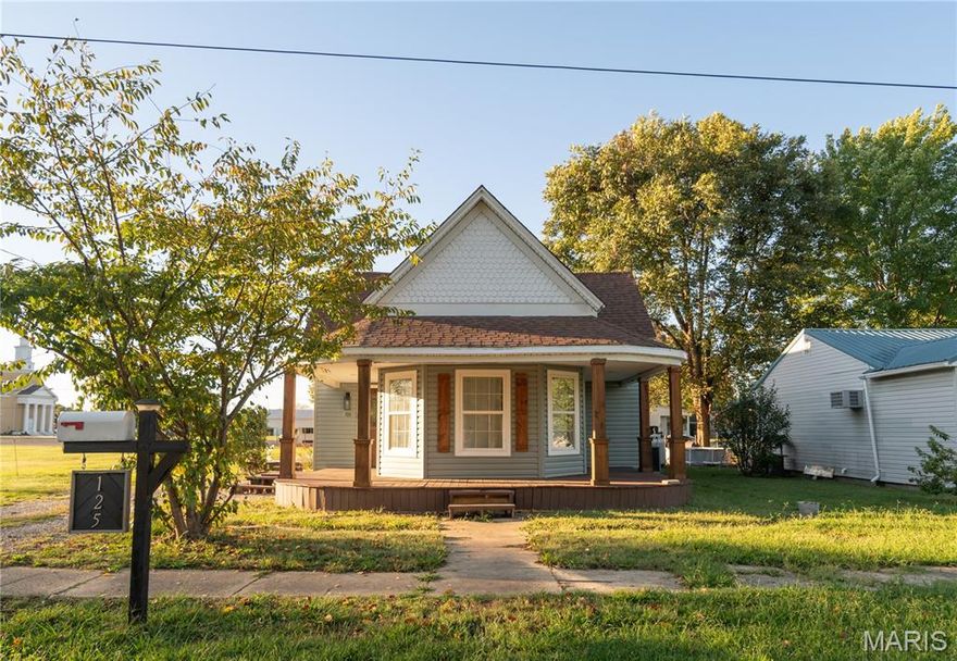 Welcome to 125 W Francis Street, Dexter, MO - a timeless 3-bedroom, 1-bath craftsman-style cottage full of character and warmth. Step inside to find a cozy living room with a beautiful fireplace and a classic staircase leading upstairs. The main level features 10-foot ceilings with wood beams, along with a newly updated kitchen and bathroom.

Outside, enjoy the inviting wraparound front porch, a side deck perfect for relaxing, and a spacious backyard on a generously sized lot. This home blends historic charm with modern updates - ready for you to make it your own.