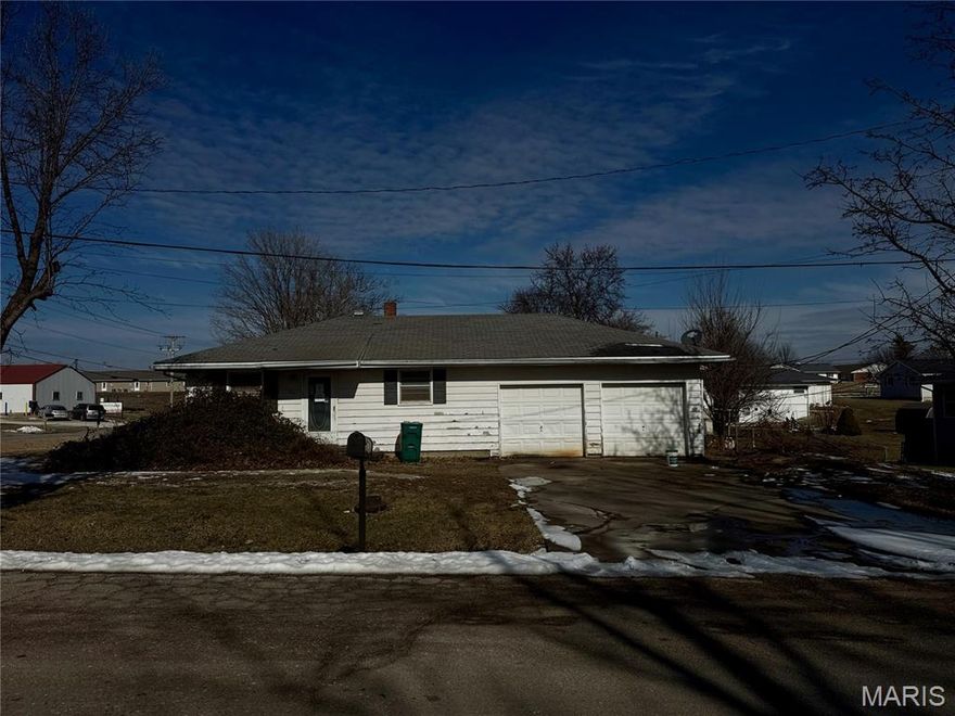 Investor opportunity! This three bedroom, one bathroom home sits on a corner lot with a 2-car garage in a high-demand location near the town's high school, ideal for strong rental or resale potential. With solid bones and plenty of room for updates, it’s a perfect candidate for potential investors or anyone eager to build equity. Buyer to verify all information. Being sold As Is. No repairs, inspections, or warranties will be provided. No disclosures available. To submit offers/bids or view additional details, please visit www.mynextbid.com. All offers/bids will be subject to Seller Approval (minimums may apply).