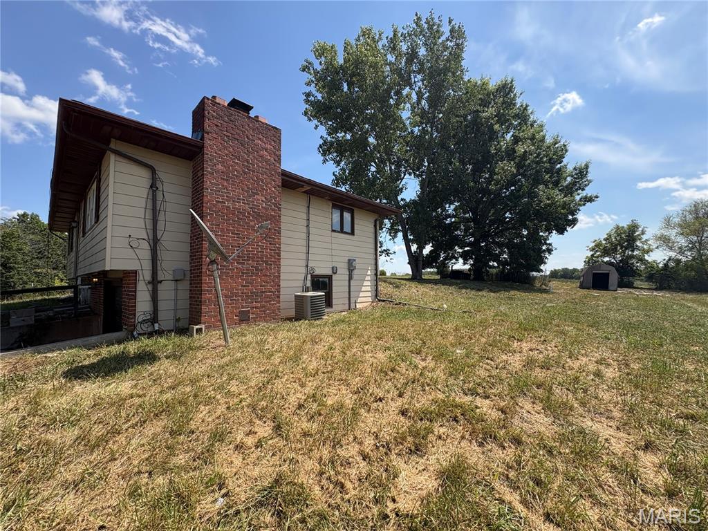 Photo of 1310 Private Road 1337, Moberly, MO 65270 (MLS # 26053325)