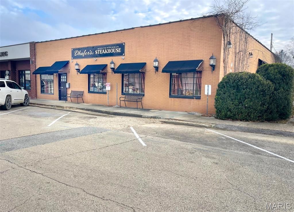 Photo of 117 S Locust Street, Dexter, MO 63841 (MLS # 25079943)