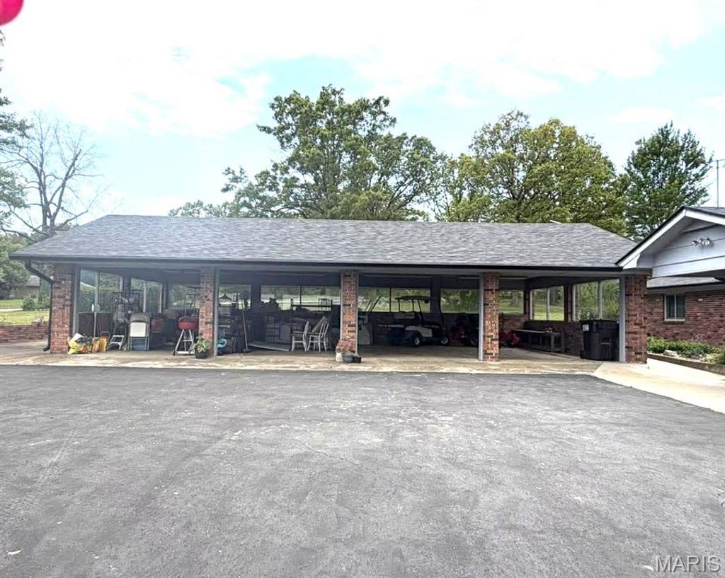 Photo of 26541 Lake Shore Rd, Lebanon, MO 65536 (MLS # 26027016)