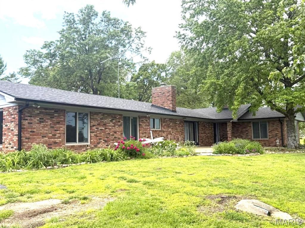 Photo of 26541 Lake Shore Rd, Lebanon, MO 65536 (MLS # 26027016)