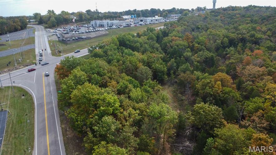 Opportunity awaits.  5+/- acres on the corner of Hwy 21 & Hwy Y in De Soto.  583 feet Hwy 21 frontage & 335 feet on Hwy Y  Zoned commercial, this wooded undeveloped land is ready for anything needing a spot with a high traffic count.