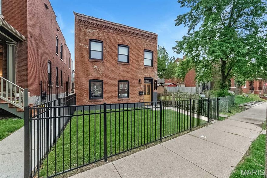 OPEN SAT, 4/25: 11-1. Welcome to an exceptional residence where flawless modern design meets the timeless appeal of Benton Park. Fully renovated in 2022, this spectacular 3 BR ,2.5 BA home offers a rare, turnkey opportunity: enjoy all the luxury of a brand-new build without a single project left undone. Simply bring your bags & move right in! Step inside to an airy, open-floor concept main level defined by clean lines & sophisticated contemporary finishes. Designed for entertaining, the show-stopping chef’s kitchen boasts a stunning waterfall island, a custom-designed coffee bar, bonus pantry cabinetry, & warm reclaimed cedar accents that perfectly balance modern luxury with historic character. Seamlessly transition from the living area through sliding glass doors to your private outdoor retreat. The expansive patio serves as a true extension of the home’s living space—providing ample room for al fresco dining, weekend entertaining, or quiet evenings under the stars. A fully fenced yard & a highly coveted 2-C carport with fast EV charger (Tesla compatible) completes this urban sanctuary. Upstairs, unwind in a luxurious primary suite tailored for ultimate comfort and relaxation. 2 addtl spacious BR’s share a beautifully appointed Jack-and-Jill bath, while a convenient 2nd-floor laundry room makes daily routines a breeze. All systems are newly modernized, including high-efficiency, dual-zoned HVACs that ensure perfect comfort on every level, all year round. Experience the walkability, history, and vibrant lifestyle of Benton Park without compromising on modern convenience.