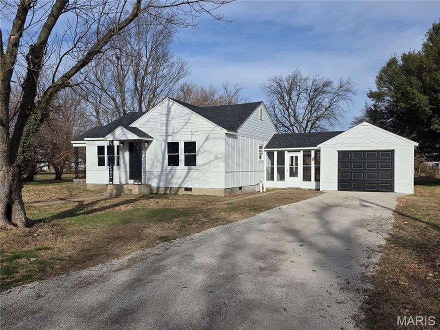 Completely remodeled and ready to move into!  Located near the center of Sikeston, close to shopping, schools and banking.  The roof is brand new with Owens Corning Duration 30-year shingles, along with LP Smartside on the outside.  The kitchen has been competely redone with new cabinets and counter tops.  All kitchen appliances are new and come with factory warranty.  The wiring, lights, switches, outlets, and breaker box are new, along with pex plumbing.  Flooring and paint are all new as well.  The sunroom is perfectly placed, allowing you to walk from the enclosed garage to the house and not be exposed to the weather.