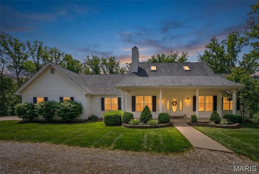 Welcome to this perfect custom built home nestled in desirable Garland Woods surrounded by 12 acres of wooded privacy & 1 acre stocked pond! You are welcomed into this open concept floor plan through the vaulted great room featuring soaring ceilings & cozy wood burning fireplace flanked by built-in shelves. The designer kitchen offers stunning staggered grey cabinetry, granite countertops & SS appliances including deep under mount sink, refrigerator, microwave, stove/oven, & dishwasher. The oversized 8’ x 4’ center island will be the focal point while entertaining family & friends. Breakfast room leads out to the covered back deck, the perfect spot to enjoy your morning coffee while overlooking the heavily tree lined property. Formal dining room is right off the kitchen providing easy access for holiday gatherings. Main floor laundry and half bath are just down the hall. The main level expansive primary suite features soaring vaulted ceilings, walk-in closet, and huge on suite bath. Dual vanities, make-up station, separate shower plus large corner soaking tub. Head up stairs which overlooks the great room through the wood spindled railing to find two more large bedrooms and full bath. Walk-out lower level is expansive, providing a sprawling family room w/ second wood burning fireplace and wet bar. Fourth bedroom is around the corner, currently being used as a hobby room plus third full bath. There is also plenty of unfinished storage space. Oversized 3 car garage, 2x6 exterior construction w/ R18 insulation, geo thermal heating & cooling, and so much more! This is private estate you have been looking for! Not too far from the highway, but far enough to feel like you are off the beaten path! Schedule your private tour today!