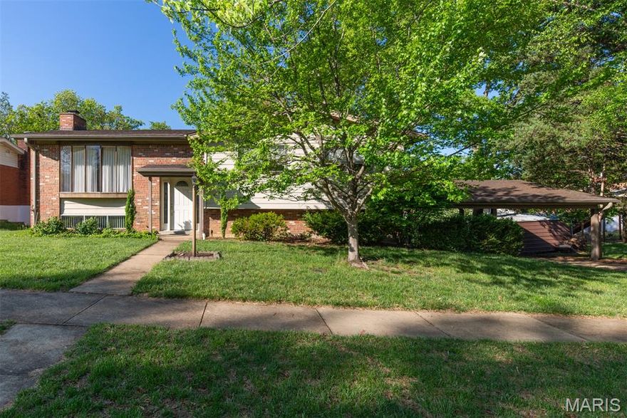 Great location! This split level home is just waiting for it's new owner to make it their own.
Main level offers a spacious living room with a big bay window allowing natural light to flow through. The dining room is spacious for special event gatherings and opens to the covered deck. Kitchen has granite topped center island with seating, as well as lots of countertop space. Three spacious bedrooms with primary bath and hall bath with large vanity and linen closet.
Lower level is a walkout to the covered patio and a nice view of the above ground pool that is up and running just in time for warm summer days! A spacious family room with a bar and wood burning fireplace. There is a large room with 1/2 bath that could be used as an extra bedroom, another small room for storage, toys, you name it! This home has a lot of storage both inside and out. A shed out back (12 x 16) to store pool supplies or lawn equipment. The carport  is spacious (25 x 23) for vehicles or just a spot to hang outside. First showings start on Friday 4/24/26 at 9 am.