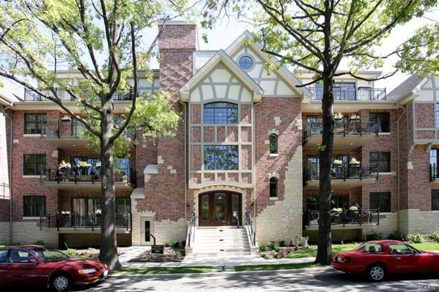 Rare offering, custom built & very gently lived-in; stately penthouse offers pure luxury living. Entry foyer w/ custom in-laid marble floors, spectacular gallery entry w/ lighted arched ceiling, HIDDEN 900+ refrigerated bottle wine cellar & custom stained quarter sewn white oak wainscoting.  Elegant formal LR w/ imported stone frplc., built-in bookshelves, 3-piece crown molding, wet bar w/ 2 Fisher & Paykel dishwashers, Scottsman ice maker & add'l wine chiller adjoin a 21' x 7' terrace, 10'-14' ceilings, formal DR + applied molding on ceiling. Gourmet cook's kitchen with Sub-Zero & Decor appliances + 6 burner cooktop, massive island w/ prep sink, walk-in butler's pantry & laundry room both w/ solar tubes PLUS huge terrace (25' x 9') w/ gas grill & drip water system.  Custom library by Architectural Millwork, over-sized port window, full bath w/ steam shower + operable skylight & walk-in closet. Ultra-lux master bdrm with 2 HUGE walk-in closets & spa-like bath, footsteps to everything! Location: End Unit, Upper Level