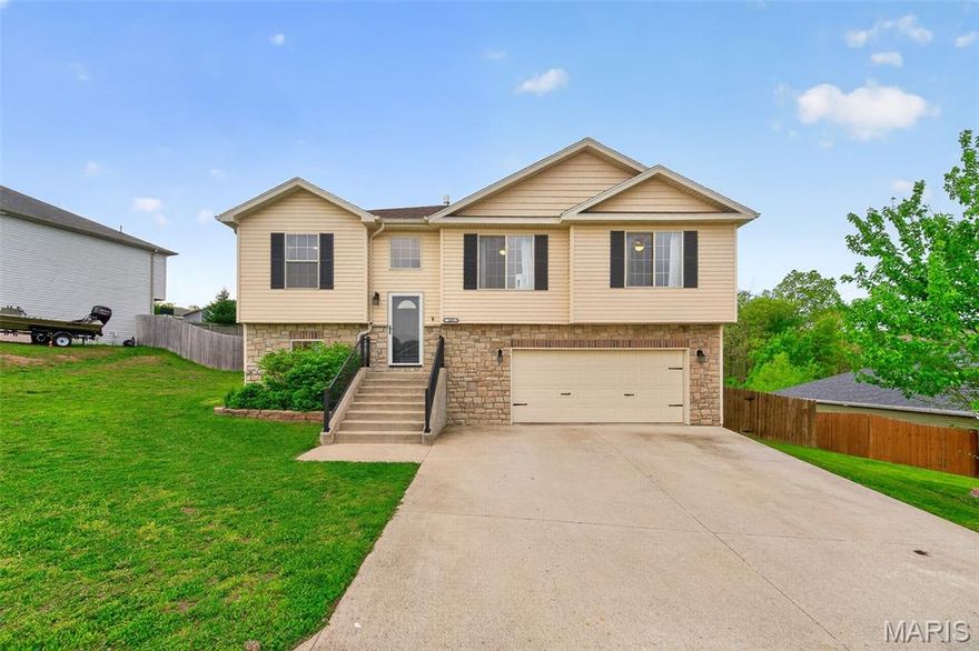 Back on the market at NO fault from the sellers! Charming 4-bedroom, 3-bath home located in the desirable Brush Creek subdivision. This beautiful home offers the convenience of city living with a private, fenced backyard for added tranquility. Inside, the main level features a cozy living room flowing into an open dining and kitchen area, complete with a breakfast bar—ideal for everyday living and entertaining. The dining space opens directly to a deck overlooking the fenced yard, creating an easy indoor-outdoor connection. The upper level includes a spacious primary suite with a walk-in closet, double vanity, and custom shower, along with two additional bedrooms and a full bath. The lower level expands the living space with a family room, fourth bedroom, full bathroom, under the stairs storage and laundry area. The oversized garage provides ample room for vehicles and storage. Stylish luxury vinyl plank and tile flooring flows seamlessly throughout the home. Conveniently located just minutes from I-44, shopping, restaurants and the Fort Leonard Wood main gate, this home balances accessibility with neighborhood comfort.