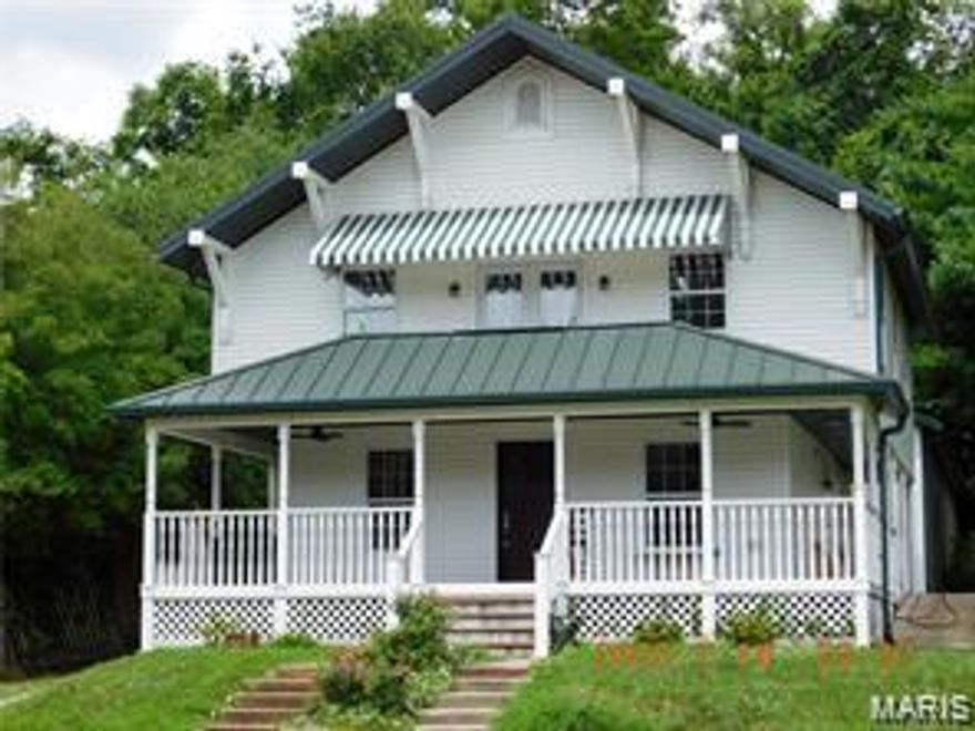 COULD BE A GREAT RENTAL
DOG LOVERS this is close to Purina Farms if you enjoy the dog shows. 

Many updates including: new windows, refinished wood floors, new carpeting, updated kitchen and baths, freshly painted etc.

Great location for Purina Farms Rentals and dinning in Historic Labadie.

Could be your home, bed and breakfast, rental for Purina Farms visitors. Large 29 x 70 side entry garage could be a great grooming area for dog owners or a shop

Beautiful craftsman design with refinished wood floors, new carpeting, ceramic tile, updated kitchen and oversized side entry garage with opener into a 29 x 70 foot garage with lots of room for a shop, RV or both. The exterior has metal roof, vinyl siding plus overlook balcony and sunshade over the balcony. The front wrap around covered porch with wood floor is a great place to relax at the days end. 

Refinished wood floors, new windows, updated kitchen, new carpeting, bathrooms and much more