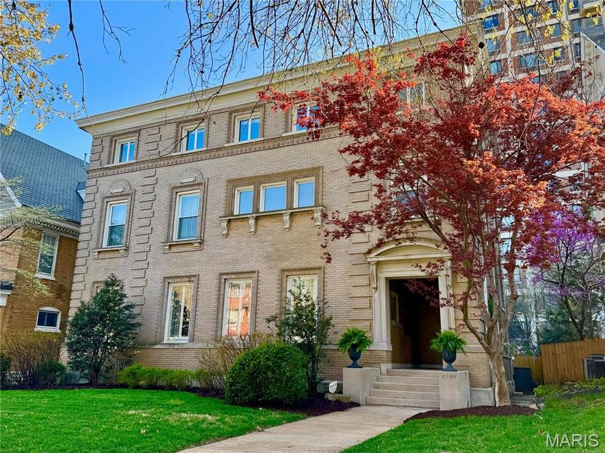 Stately Italian Renaissance home on private Westminster Place, designed in 1899 by architect George W. Hellmuth. Gracious recessed front porch opens to a stunning 25x11 marble foyer. Elegant living room features cove ceiling, leaded-glass windows, built-in bookcases & fireplace with poplar mantel. Formal dining room offers quarter-sawn oak paneling, box-bay window & fireplace. Spacious updated chef's kitchen with center island, stainless steel high-end Dacor & Bosch appliances. Additional appliances in mudroom mean separate catering kitchen, perfect for entertaining. Butler's pantry features original cabinetry beautifully blended with new. Grand staircase with leaded-glass window leads to primary suite with large walk-in closet & private bath. 3 additional bedrooms, stack W/D, 1 bath + sunroom round out the 2nd floor. Covered side porch off dining room, patio, driveway & 2-car garage. 3rd floor is a 1,600 SF apartment with 2 bedrooms, full bath, large living room & eat-in kitchen—perfect for rental or guests. 3 zones of HVAC. Own a piece of architectural history with modern comfort in a prime Central West End location.