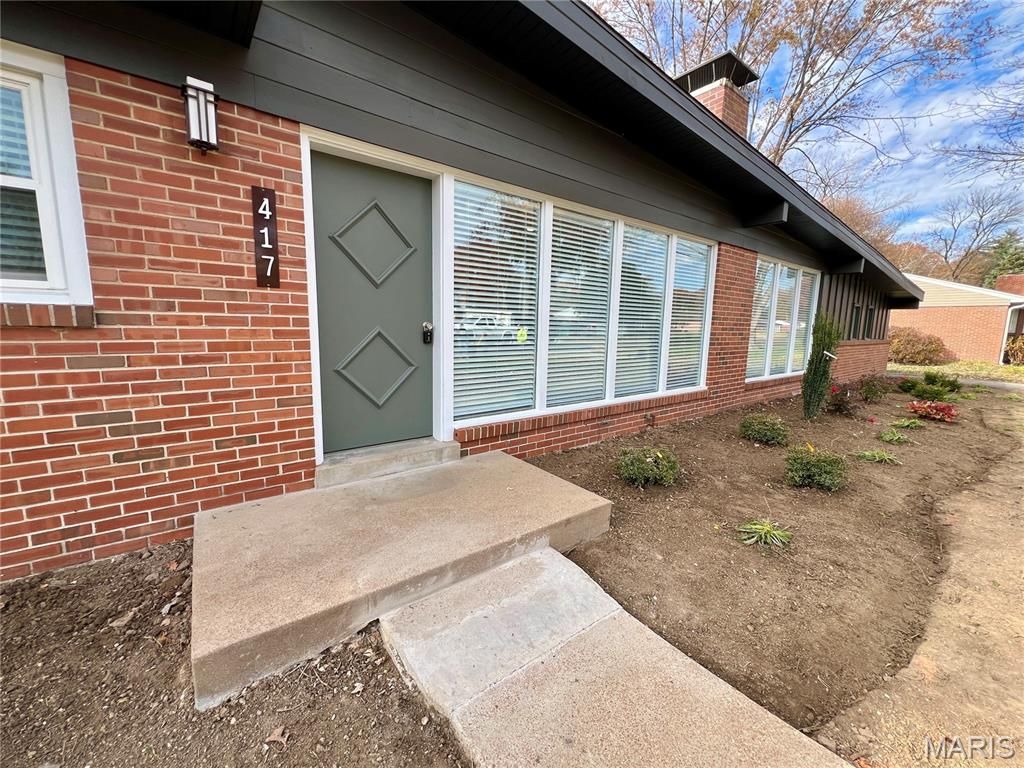 Photo of 417 Wenneker Drive, Ladue, MO 63124 (MLS # 25079545)