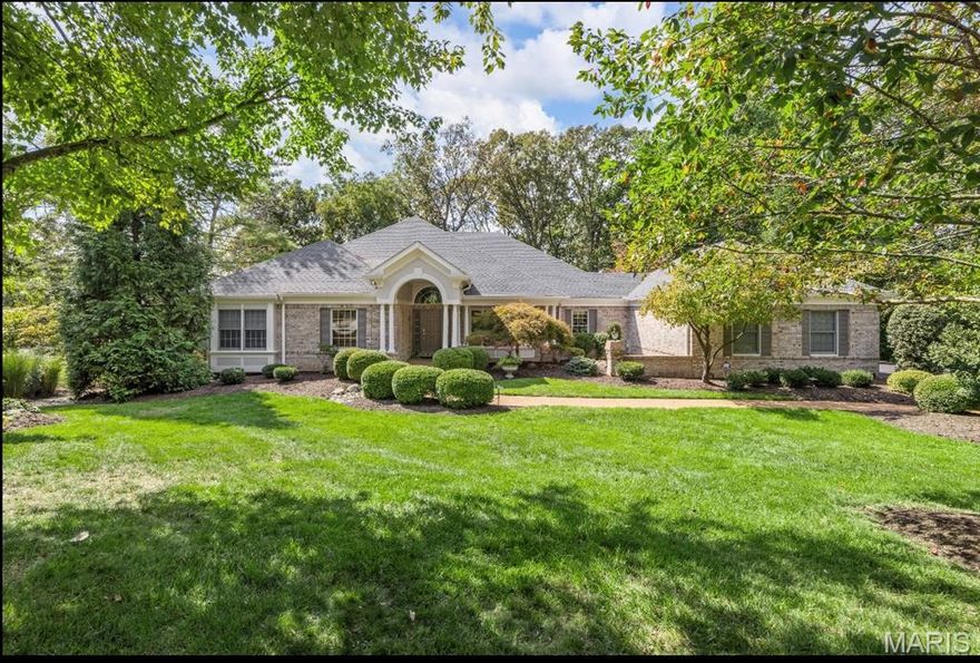 Gorgeous Ranch Home on Premium Wooded lot w Lake Views situated on a Cul-de-sac in Desirable Wildhorse Subdivision. Approximately 1.49 acres & 4500 Sq. Ft. of Living Space. Freshly Painted! Newer Roof! Outstanding Highlights include: Brick and Frame Exterior. Anderson Windows throughout most of the House. Ceiling Fans in the Main Level Bedrooms and Office. Beautiful Kitchen has a Center Island, Skylights, White Appliances, Oven, New Built-in  Microwave, Granite Countertops & Adjoins the Breakfast Room & Sitting Room with Book Shelves and Cabinets. Stunning Vaulted Sun Room with a Tongue and Groove Wood Ceiling that Opens to 2 Maintenance Free Decks. 3 Bedrooms on the Main Flr, Two connected by a Jack & Jill Bath. The Master Bedroom boasts a Coffered Ceiling, Custom Walk-in Closet, Bay Windows Overlooking the Parklike Yard and Lake View. Luxury Master Bathroom w Spa-Jetted Tub, Separate Bidet & Large Separate Shower. Coffered Ceilings and Chair Rail in the Dining Room. Vaulted Great Room with a Masonry Gas Fireplace. Spacious Office with Built in Book Shelves and Cabinets. Prof. Finished Walkout Lower Level has Family Room, Large Bedroom w Cedar Walk-in Closet, Updated Bath & Beautiful Bar Area has Refrigerator and Microwave/Kitchenette & Exercise Room. Functioning  Phone Booth. Main flr laundry. Central Vacuum. Intercom and Surround Sound System. Irrigation and Security Systems. Landscaped Courtyard and Landscape Lighting.  Oversized 3 Car Garage. Enjoy the Subd. Pools, Tennis Courts. & Walking Trails.