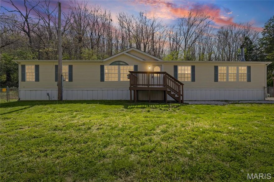 Turnkey 3 bedroom, 2 full bathroom on 1.2 Acres with 30×32 Workshop

Move-in ready home on 1.2 private acres featuring a large 30×32 workshop with water and electric on a concrete slab — ideal for hobbyists, mechanics, contractors, or anyone needing workspace or additional storage.
This well-maintained home offers approximately 1,792 sq ft with a spacious layout including a bright and updated kitchen with new flooring and new black appliances. Major improvements include new roof with solar skylights, new HVAC system, fresh interior paint, and updated electrical outlets, switches, and junction boxes throughout.
Additional features include a wood-burning fireplace, large pantry, laundry room, restored deck, and a versatile office/sunroom that can easily serve as an additional sleeping space.
The property backs to a wooded hillside providing privacy while still offering convenient access to nearby areas via Hwy 30 and State Route M.
This is a rare opportunity to own a fully updated home with acreage and a functional workshop.