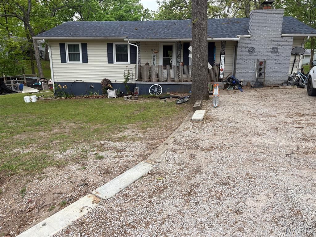 Photo of 907 Elm Drive, Warsaw, MO 65355 (MLS # 26024427)