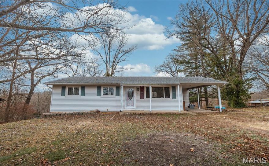 Charming 3-bedroom, 1-bath ranch sitting over an unfinished basement, offering great potential for additional storage or future living space. This home features an open floorplan with laminate flooring throughout the main living areas. Recent updates include a new roof and sump pump in 2024, giving peace of mind for years to come. Enjoy the convenience of a 1-car carport, a welcoming covered front porch, and a layout that flows comfortably from room to room. Perfect for first-time buyers, downsizers, or anyone looking for a well-maintained home with room to customize.