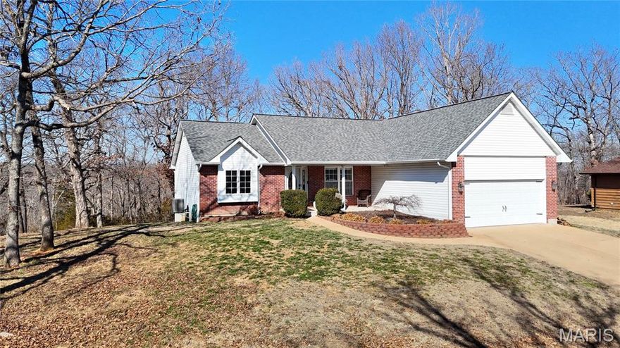 Welcome home to this stunning 3-bedroom, 3-bathroom home nestled in a desirable Raintree Plantation Neighborhood, offering the perfect balance of comfort and style. Step inside to soaring vaulted ceilings and beautiful hardwood floors complemented by carpeting. The spacious living area features a cozy fireplace. This home has a bit of an open floor plan with a separate dining room, but still open to the living area. The kitchen offers custom cabinets and an eat-in kitchen as well as granite countertops. The main floor has generously sized bedrooms and includes a master suite with a huge bathroom featuring a bay window, garden tub with a separate shower and also a double sink vanity. The finished walk-out basement is an entertainer’s dream with ample space for gatherings, as well as abundant storage options. Discover and enjoy a private backyard with lush landscaping and a large deck—ideal for relaxing or hosting. With a two-car garage and a location that combines natural beauty with community living, this home has it all! HOA information and fees to be checked by buyers side.