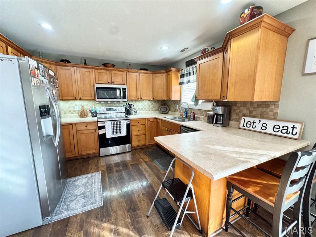 Photo of 1407 Birch Creek, Dexter, MO 63841 (MLS # 25079956)