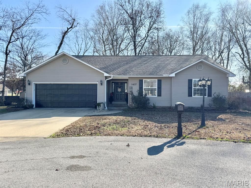 Photo of 1407 Birch Creek, Dexter, MO 63841 (MLS # 25079956)