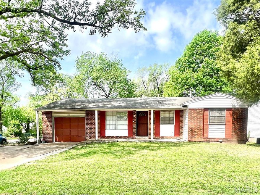 Check out this great home! Located on a very large corner lot, with mature trees, and plantings. This 3+ bedroom 3 bath home offers so much! The interior has been updated and upgraded with style and function! New flooring in the living and dining areas, hard wood flooring in the bedrooms. The kitchen has a large center island with a built in cooktop and oven.  Other appliances include a built in microwave, dishwasher and a fantastic double door stainless steel refrigerator. There are 3 bedrooms on the main level, including a primary bedroom with an ensuite full bathroom. The lower level has over 650 square feet of living space, an office or den which could be easily converted to another bedroom with an egress window. 2 large storage areas, and another bathroom. This fantastic house rounds out with extra large back yard, a lovely balcony off the dining room, an oversized 1 car garage, and parking in the driveway for at least 4 more cars. Seller is selling the property as is.