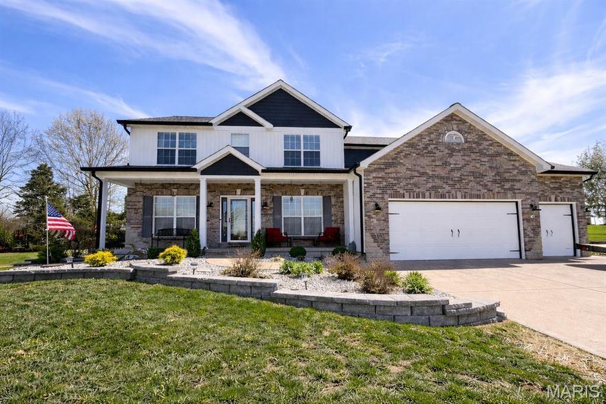Tucked at the top of a quiet cul-de-sac in Westborough Estates, this one has been completely dialed in. Over 3,100 sq ft across two floors, 4 bedrooms, 3.5 baths & a 3-car garage with epoxy floors, 11-ft ceilings & 22-ft depth — built for the buyer who wants space to actually live. The main level flows the way it should: formal dining with coffered ceilings, a private office behind French doors, a great room anchored by a gas fireplace & built-in bookcases, a main level laundry room, and a kitchen that delivers — granite counters, stainless appliances, walk-in pantry, coffee bar & a breakfast nook that opens straight to the sunroom and screened porch. The backyard is your own park: half an acre, basketball court, fire pit, hot tub hookup & total privacy. Upstairs, the primary suite is a genuine retreat — 27x16, vaulted ceiling, walk-in closet & a spa bath with double vanity, jetted tub & separate shower. Three more oversized bedrooms & an updated hall bath complete the upper level. The basement is already fully framed & stubbed for a full bath — finish it and this becomes a 5-bedroom, 4.5-bath home. That's instant equity with a clear path. The sellers didn't cut corners on the way out either: new siding, gutters & fascia (2025), full WiFi irrigation (2024), new landscaping & retaining walls (2024), new water heater (2024), dual-zone smart HVAC, water softener (2023). New carpet & LVP throughout (2022). Troy R-III schools. This one is ready — come see it.
